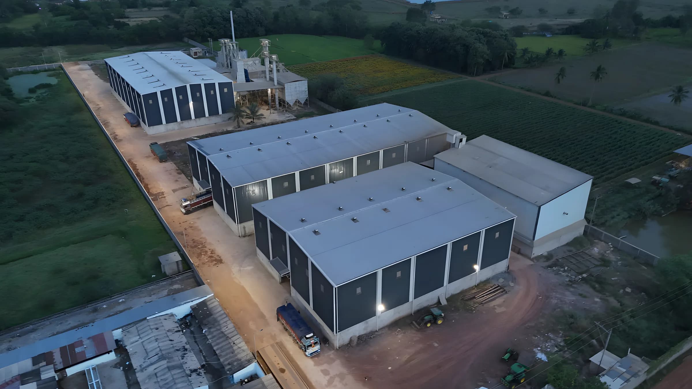 Aerial view of the Goyal Agro milling plant and warehouses at dusk